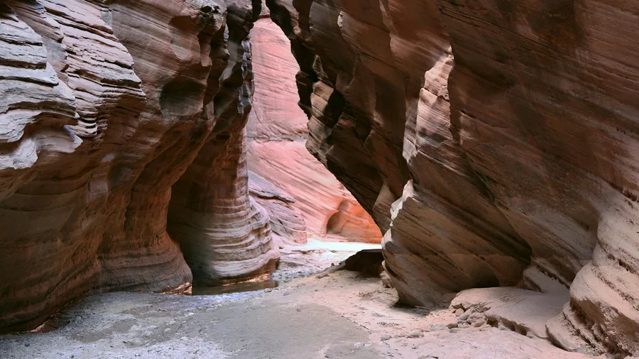 Forget the Grand Canyon Crowds — These 8 Canyon Hikes Are Just as Jaw-Dropping Buckskin Gulch's Narrow Slot Corridor