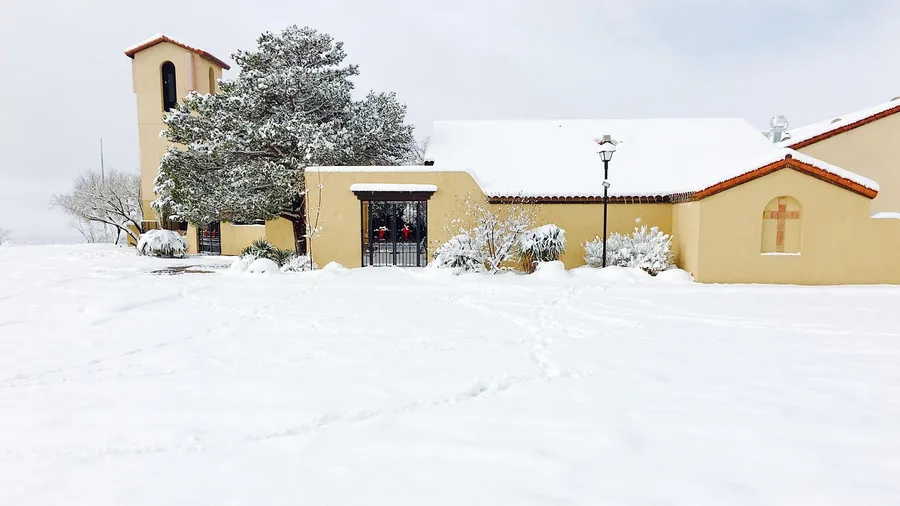 11 Mountain Towns That Are Even Prettier in Winter Than in Summer See Taos's Adobe Plaza Under Snow